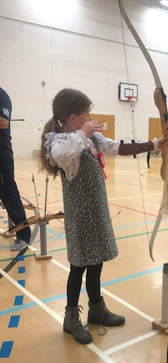 Amelia_playing_archery