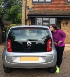 Charlotte in her car