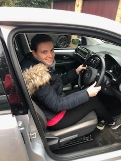 Charlotte in her car