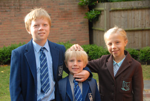 Chas: young people in school uniform smiling