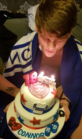 Connor: young man with 18th birthday cake