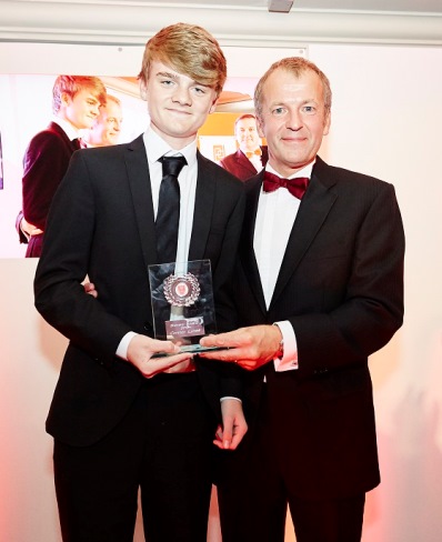 Connor: young man is presented with award