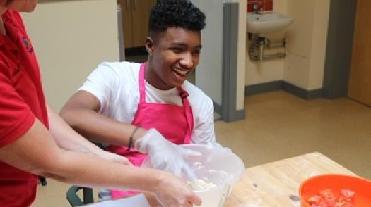 Jake cooking at The Children's Trust