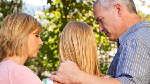 Concerned parents with child