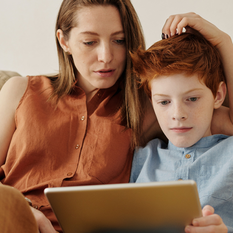 parent and child on sofa