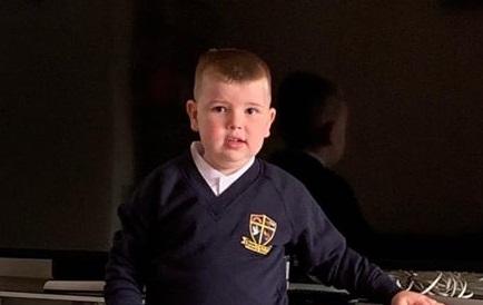 Harry in his school uniform