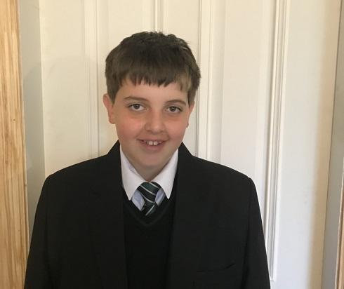 Milo in his school uniform