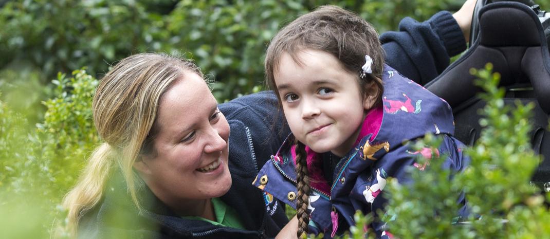 Disabled girl in a garden