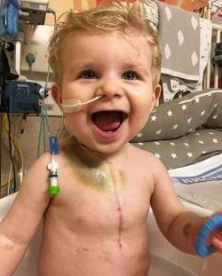 Arthur smiling at the camera while in hospital again