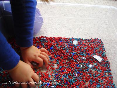 Sensory tub with child's hands