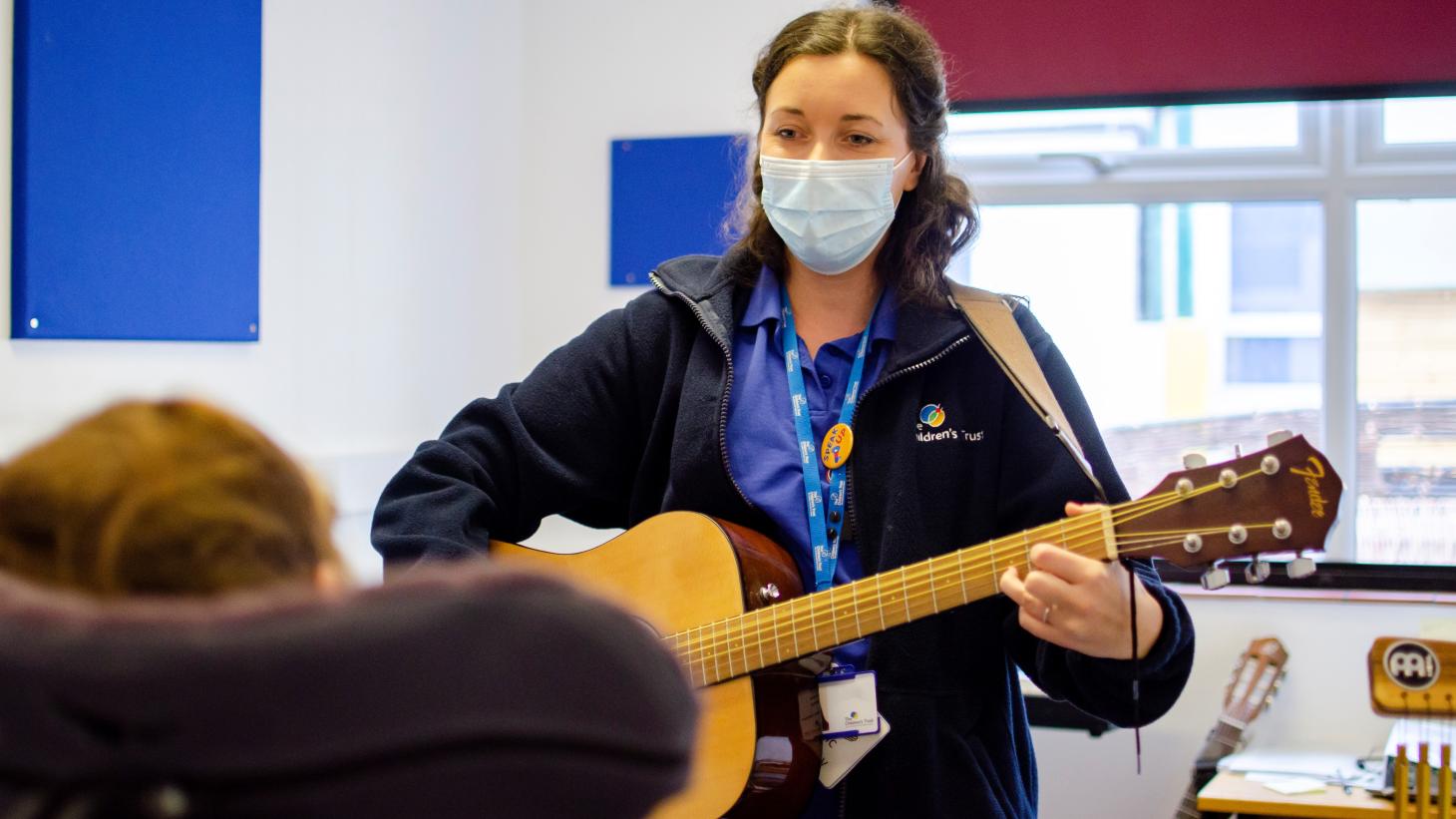 Music Therapist, Sophie in a Therapy session