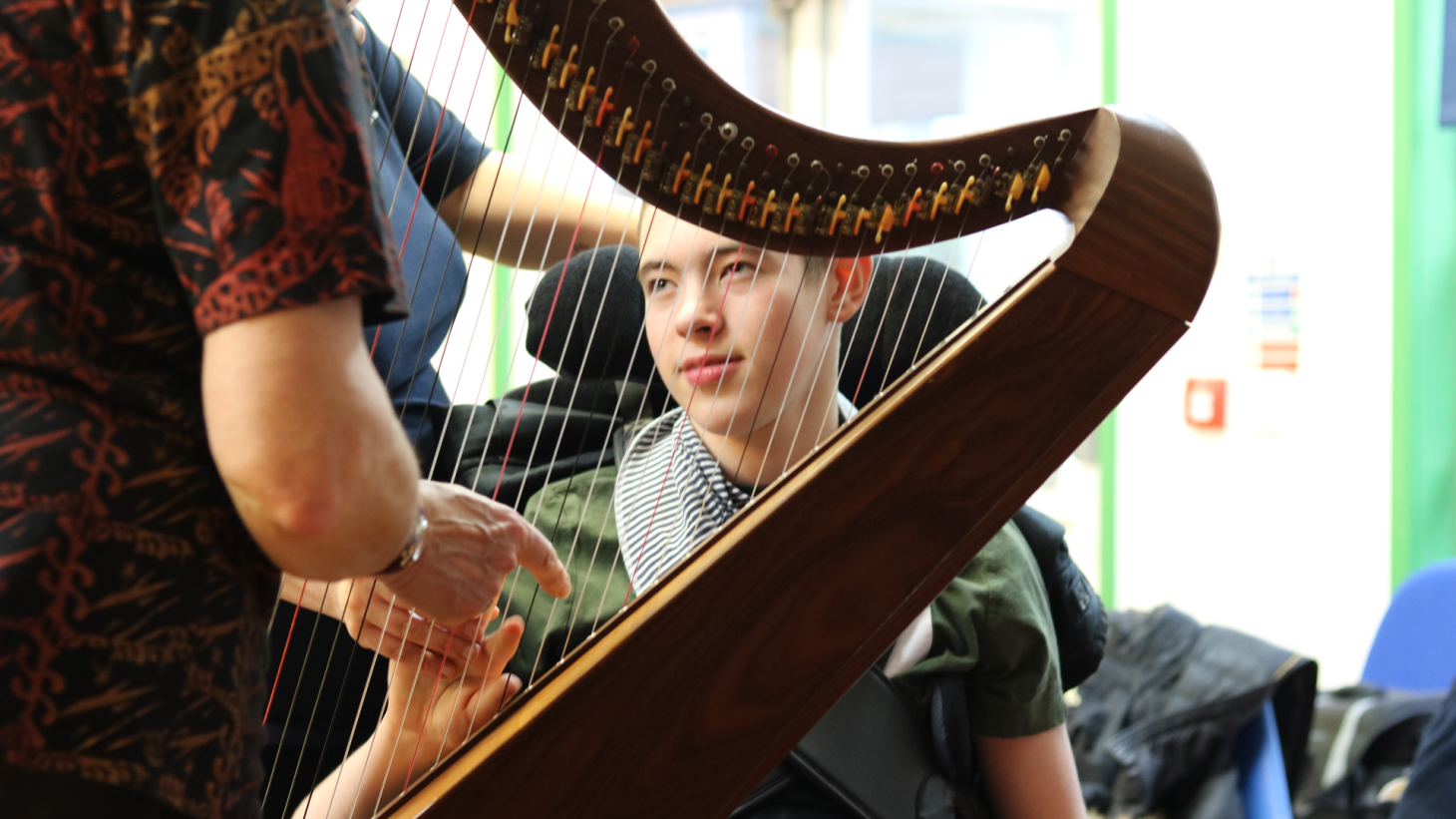 Finn at a making music workshop