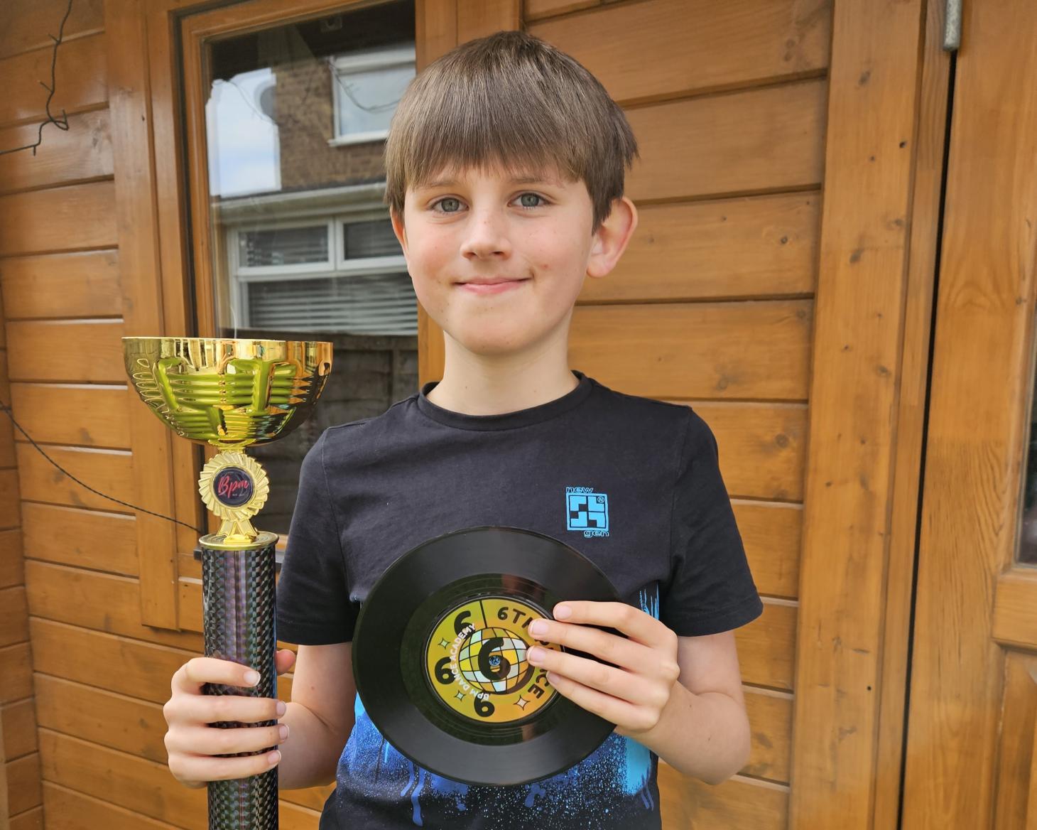 Jack holding a trophy