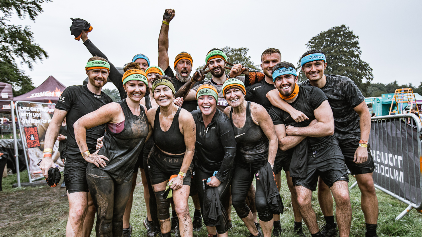 Runners at the end of a Tough Mudder race