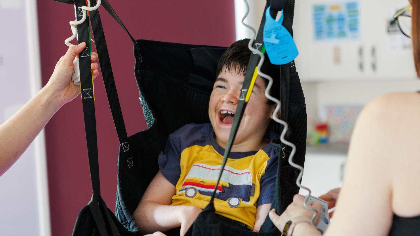 Elijah laughing during his daily routine