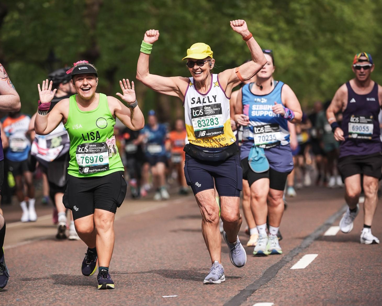 Sally running the London Marathon and cheering