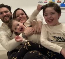 Laura, Ezra and family in Christmas Pyjamas