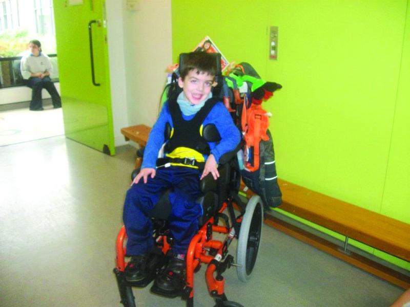 Charlie in his wheelchair at The Children's Trust