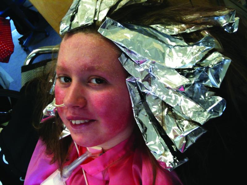 Clare getting her hair done