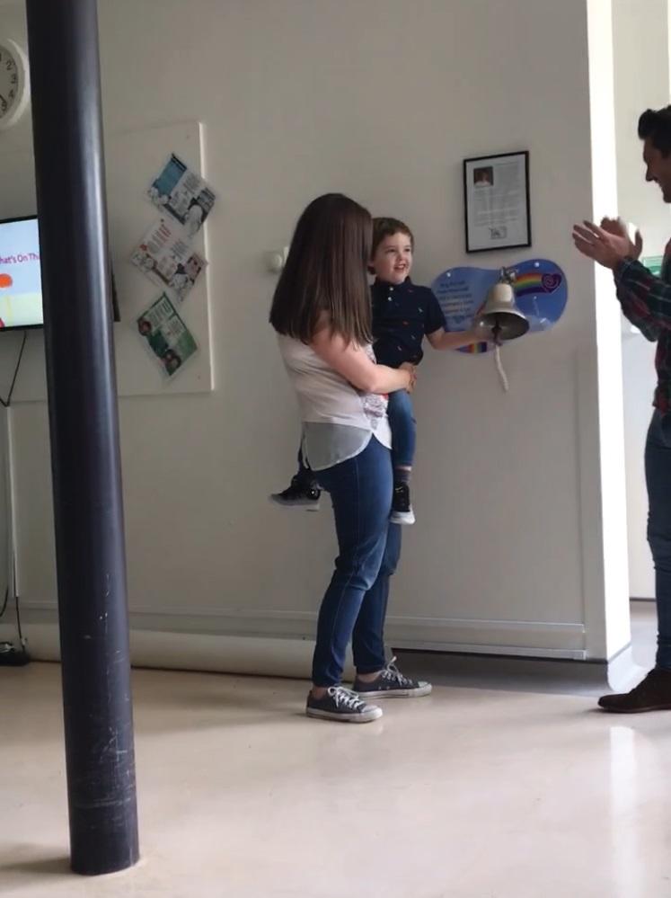 Ezra ringing the going home bell