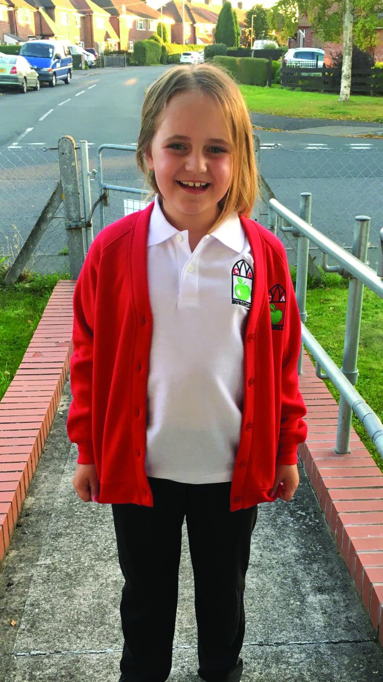 Jasmine in her school uniform