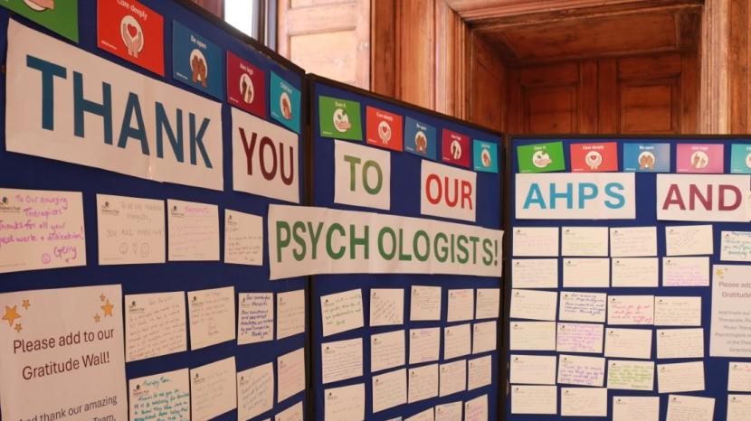 Blue notice board displaying messages of thanks for AHPs at The Children's Trust