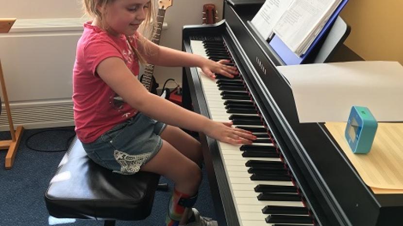 Jasmine playing piano