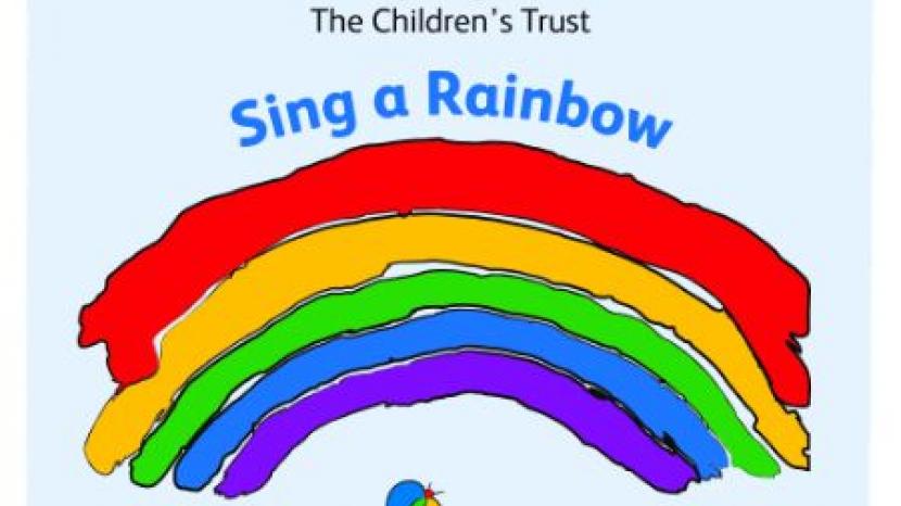 Rainbow with the words: Elaine Paige Sing a Rainbow